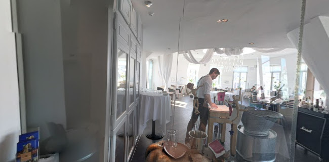 Tančící dům - Ginger & Fred Restaurant