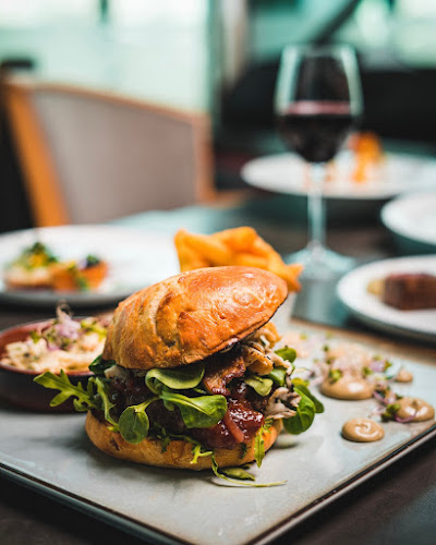 Tančící dům - Ginger & Fred Restaurant