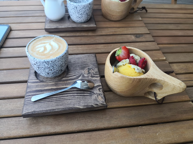 Opinii despre Coffee Trail Garden în Brno - Gastronomie a pohostinství